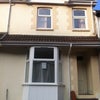 Photo 6: House Front