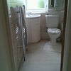 Photo 2: View of bathroom from hallway