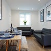 Photo 6: Lovely communal space ( now with TV! )