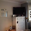 Photo 3: Tv and window shutters