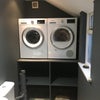 Photo 4: Utility room with washer drier.