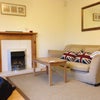 Photo 3: Living room with French doors onto back garden and ample seating