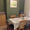 Photo 6: Separate dining room with large table and 8 chairs