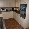 Photo 2: Clean fully equipped kitchen