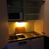 Photo 3: The 'kitchen' with doors open