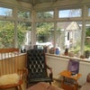 Photo 4: bright and sunny conservatory for all to use