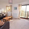 Photo 4: Living room and balcony