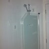 Photo 3: Fully equipped bathroom with bath and over the bath shower.  I rarely use this room.