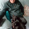 Photo 8: Steve with our cats, Nera and Soo.