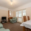 Photo 4: Large Living Room with Digital TV