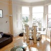 Photo 2: Living & Dining Area