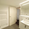 Photo 6: Bathroom - Concealed washing machine not pictured.