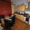 Photo 1: Bedsitting room showing kitchen