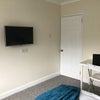 Photo 4: Wall-mounted TV in bedroom 2