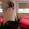 Photo 5: Bed and television 