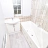 Photo 5: Bathroom with shower