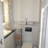 Photo 4: Downstairs cloakroom