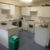 Photo 6: Big kitchen with electric stove.
