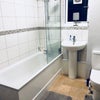 Photo 9: bathroom/toilet