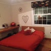 Photo 2: Comfy bed and plenty of storage