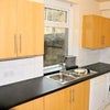 Photo 4: Modern kitchen with dishwasher and microwave