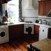 Photo 5: The kitchen