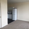 Photo 6: Kitchen adjoining living space 