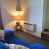 Photo 2: COZY SITTING ROOM