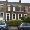 Photo 1: Front of house