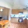 Photo 5: View of open plan kitchen and living room