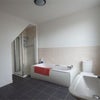 Photo 5: Large bathroom and shower + laundry/dryer room