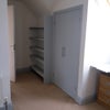 Photo 4: shelving and one of the fitted cupboards