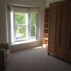 Photo 2: Other end of room facing out over the High St.