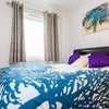Photo 4: Extra Storage Under Mattress Bright Comfy Bedroom
