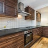 Photo 3: Living room / kitchen