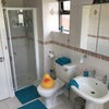 Photo 8: Spacious bathroom with shower & bath, cleaned every week.