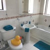 Photo 9: Spacious bathroom with shower & bath, cleaned every week.