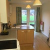Photo 2: Communal kitchen/ dining room