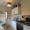 Photo 3: Clean and well equipped Kitchen