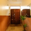 Photo 5: Entrance to building