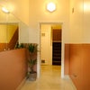 Photo 6: Entrance to building