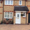 Photo 2: House front and parking