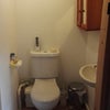 Photo 3: Loo and basin in the room