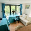 Photo 3: Living Room (Also a balcony by bi-folding doors)
