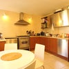 Photo 2: Kitchen and dining area