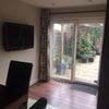 Photo 7: Conservatory with flat screen tv 