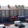 Photo 3: Shops across the road viewed from bedroom 2