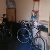 Photo 5: The porch entrance with bike rack.