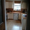 Photo 3: Kitchen with access to cellar
