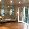 Photo 2: Large Spacious Living Area with Juliet Balcony